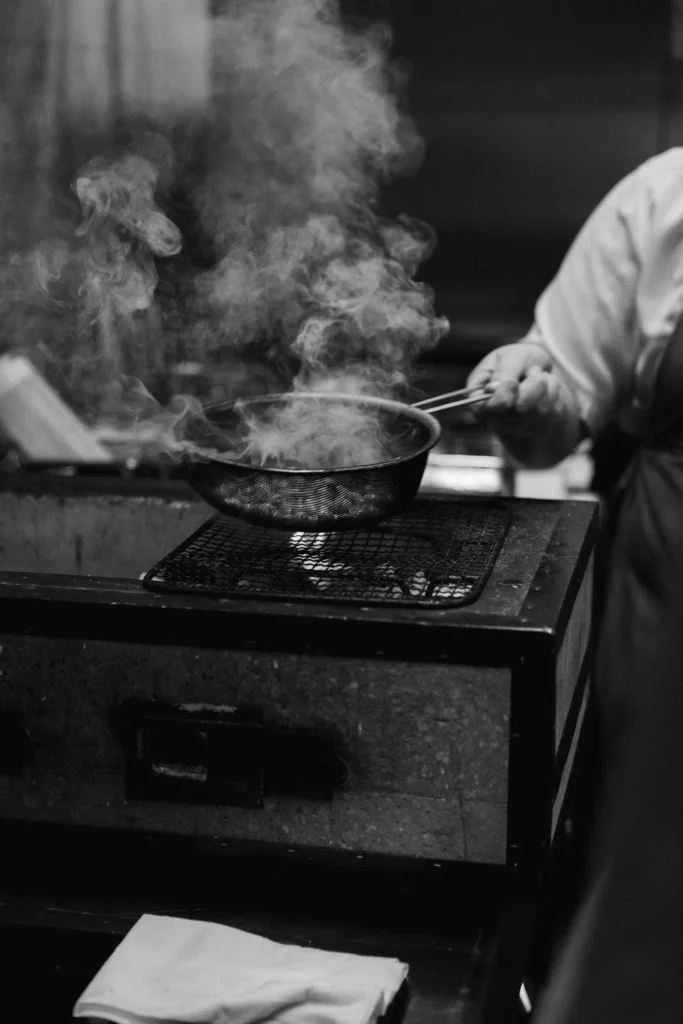 Spesso's chef prepparing a dish